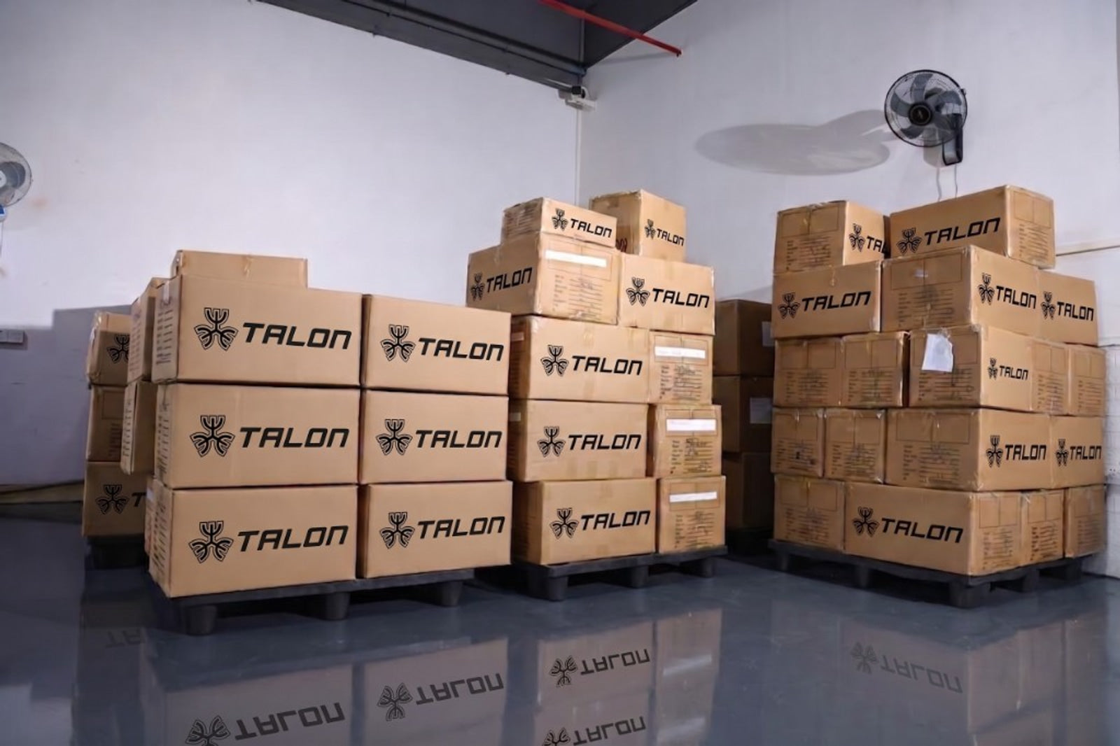 Cartons and shipping logistics for TALON apparel export transportation — TALON OEM manufacturing